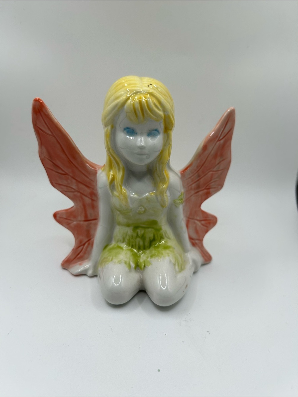 Porcelain Fairy Figurine with Coral Wings and Yellow Hair